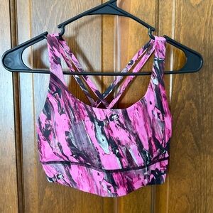 Women’s Lululemon sports bra! Size 6! Black and pink. Cross cross back!
